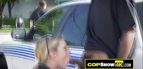  Public threeway with a black criminal and two busty MILF officers.